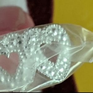 Sterling silver Avon hearts. In bear case.